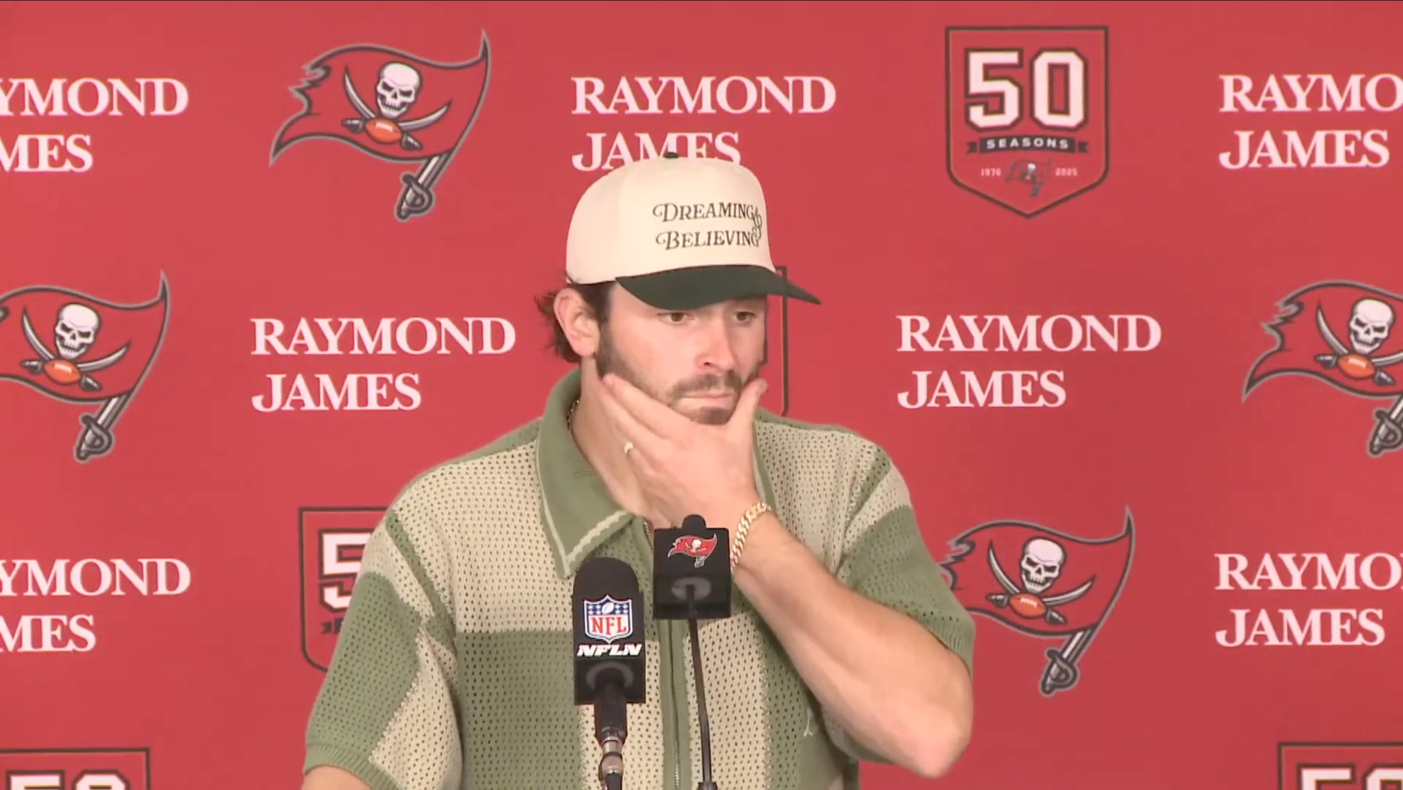 Baker Mayfield talks with reporters after the Bucs lost to the Patriots in Week 10.